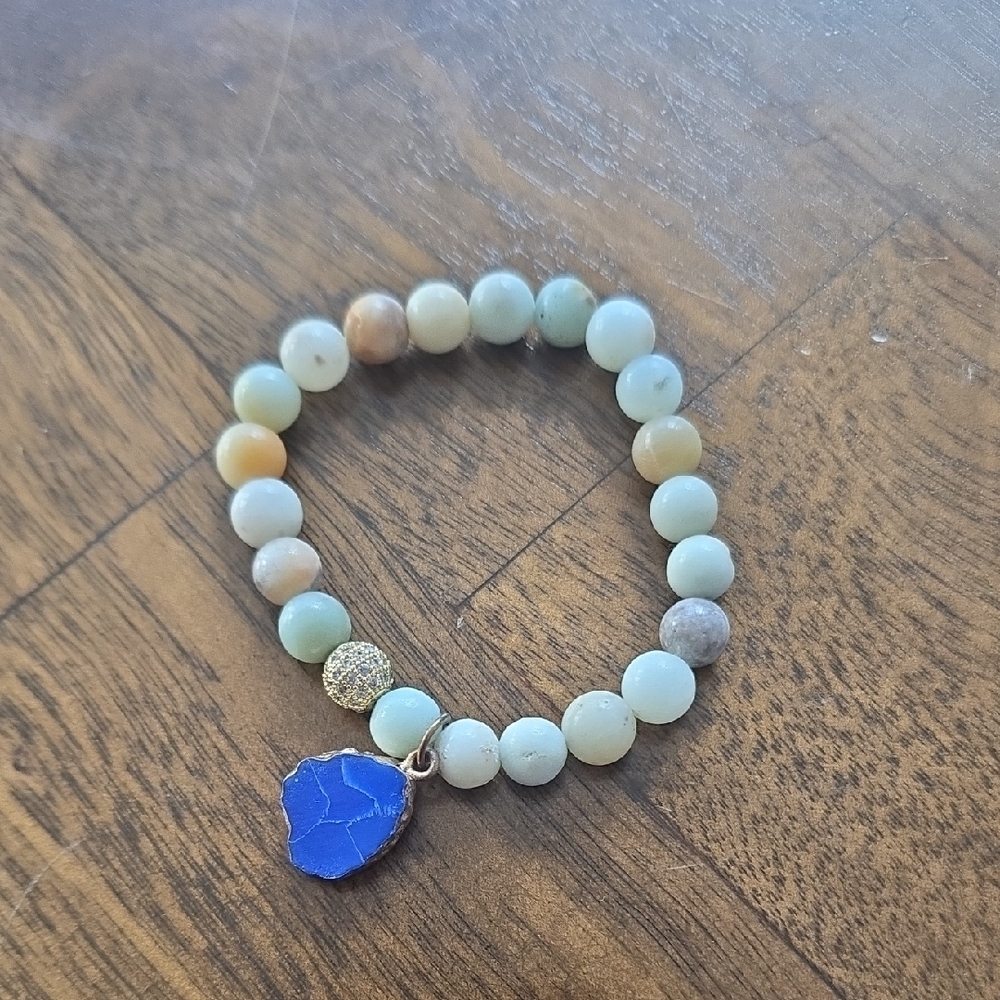 Elegant Beaded Bracelet with Blue Charm
